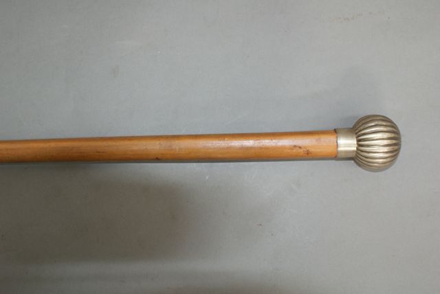 Appraisal: A Walking stick with fluted round pommel