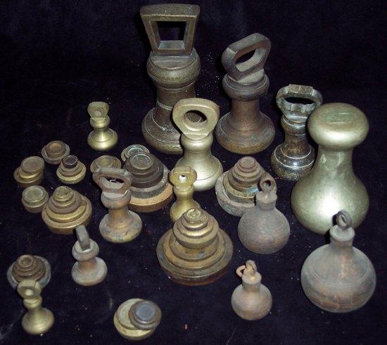 Appraisal: A quantity of pillar and other weights