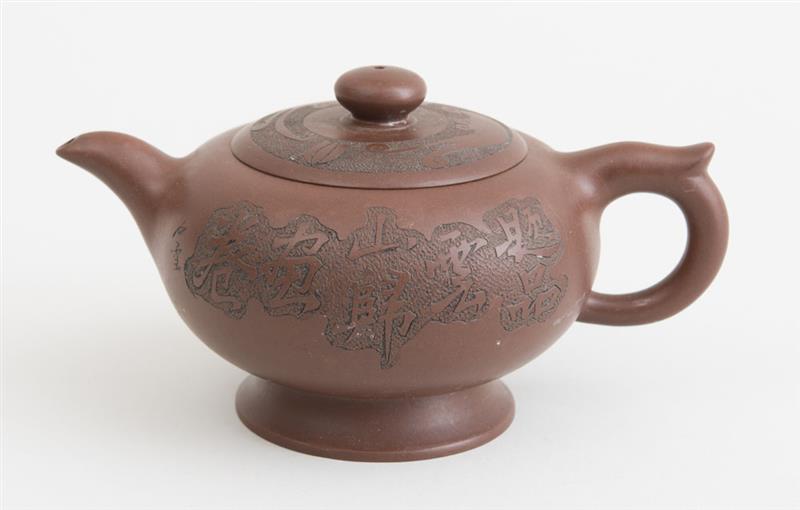 Appraisal: CHINESE ENGRAVED POTTERY TEAPOT x x in Estimate -