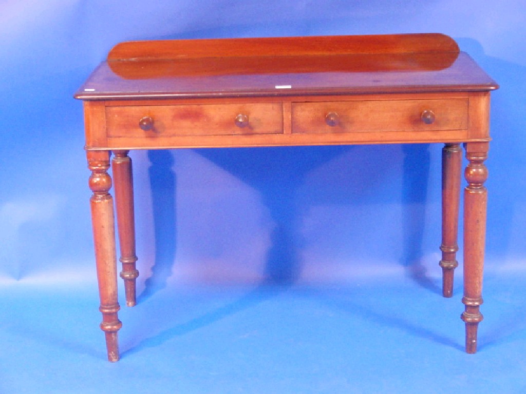 Appraisal: A Victorian flamed mahogany side table with two drawers having