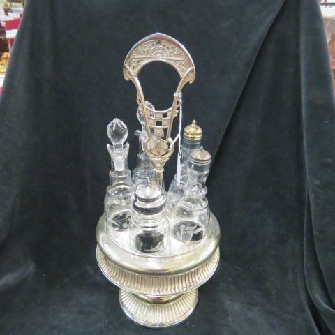 Appraisal: Silverplate Castor Set bottles with etched decor on rotating base