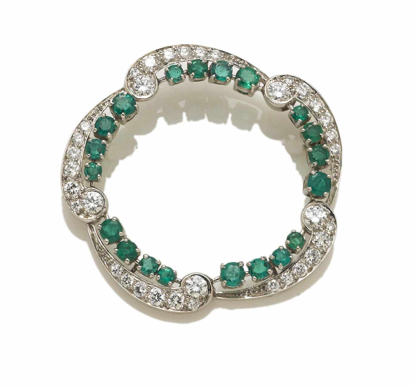 Appraisal: A diamond and emerald circle brooch Cartier signed Cartier no