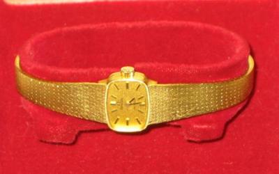 Appraisal: A LADY'S CT GOLD OMEGA DE VILLE WATCH the rounded