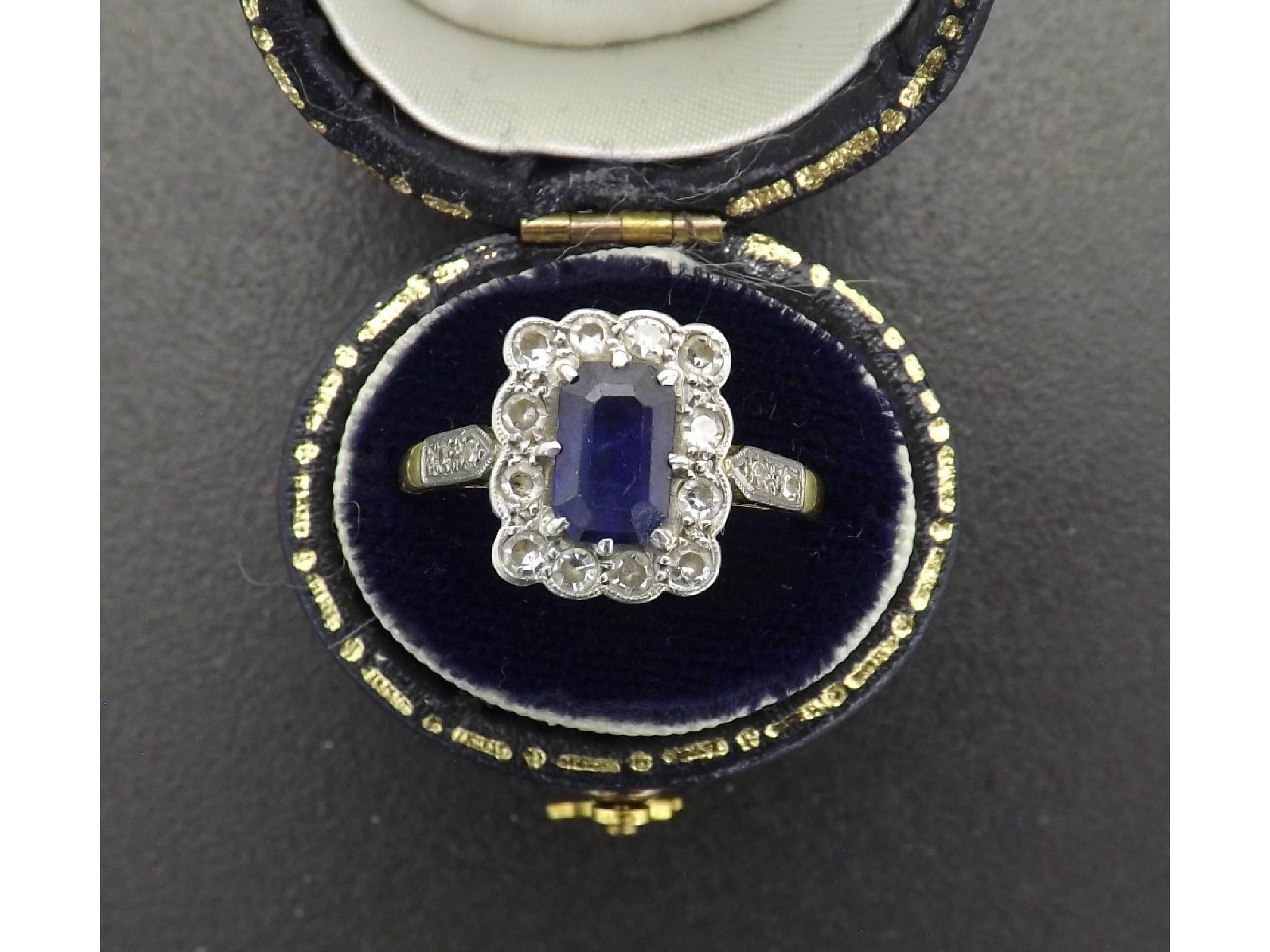 Appraisal: ct and platinum sapphire and diamond cluster ring with set