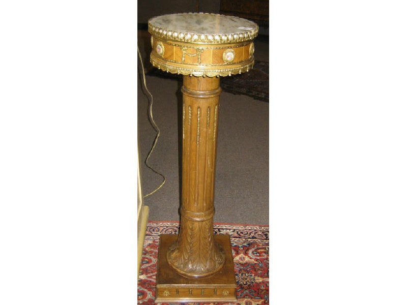 Appraisal: CONTINENTAL CARVED OAK AND ORMOLU FERN STAND Circular gilt bound