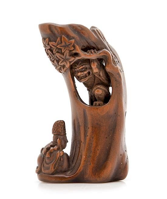 Appraisal: A Japanese Boxwood Netsuke Height inches A Japanese Boxwood Netsuke