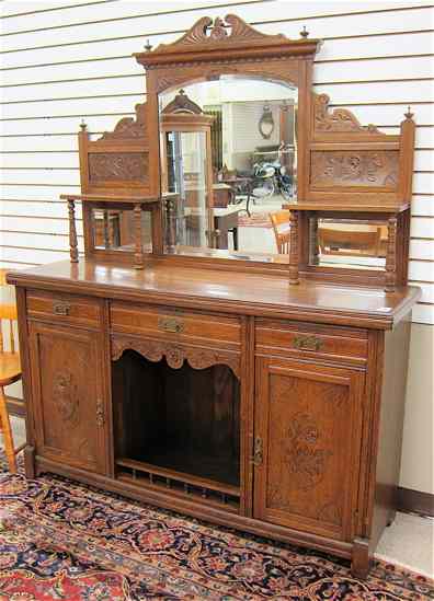 Appraisal: VICTORIAN CARVED OAK SIDEBOARD English late th century Dimensions ''H