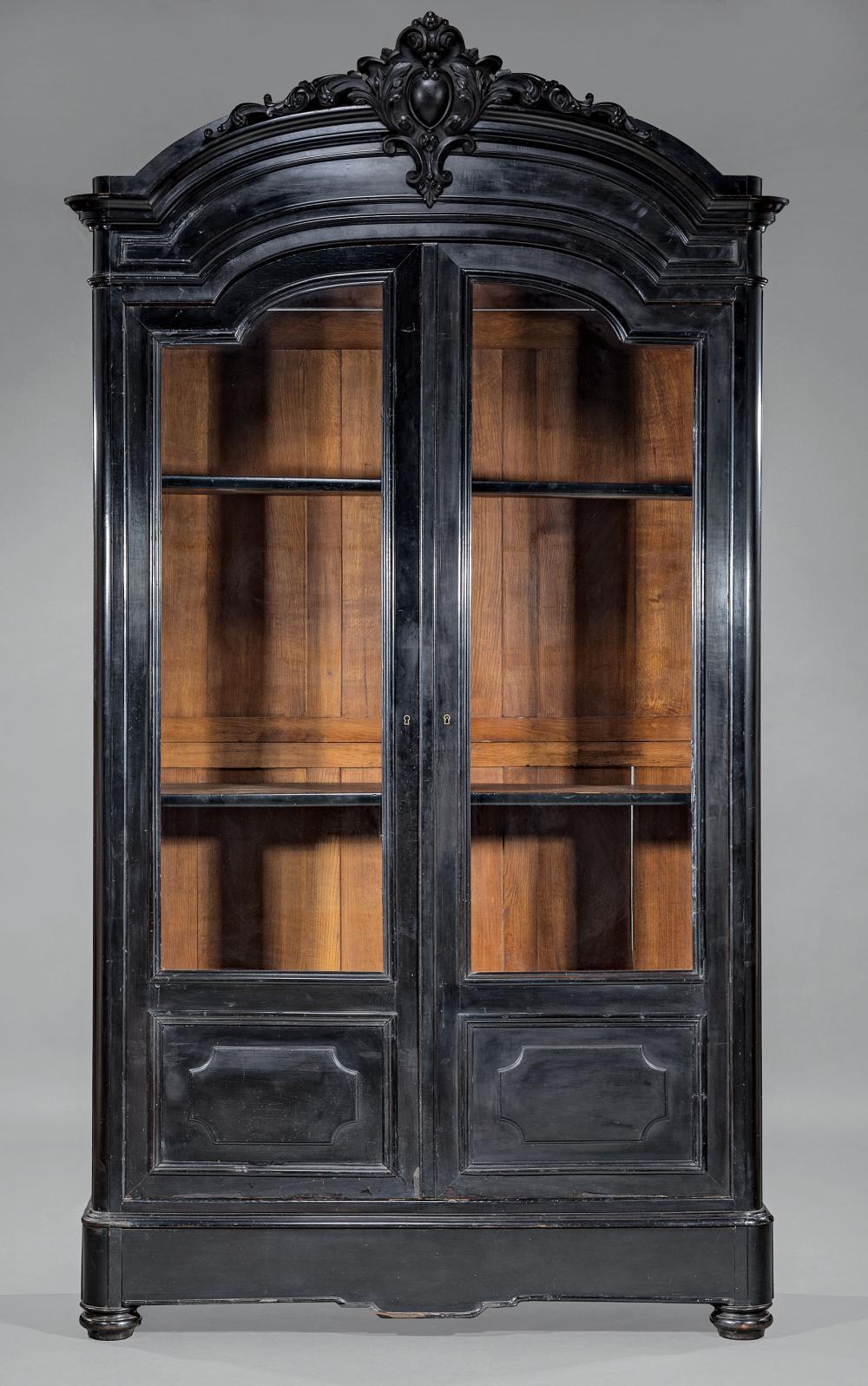 Appraisal: American Carved and Ebonized Bookcase in the Louis Philippe Taste