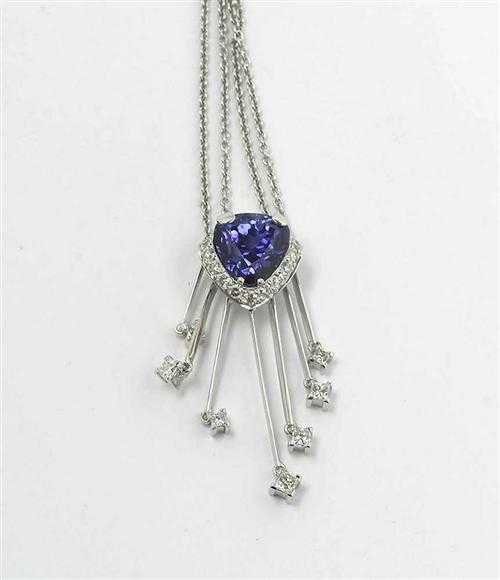 Appraisal: TANZANITE AND BRILLIANT-CUT DIAMOND NECKLACE White gold Very fancy necklace