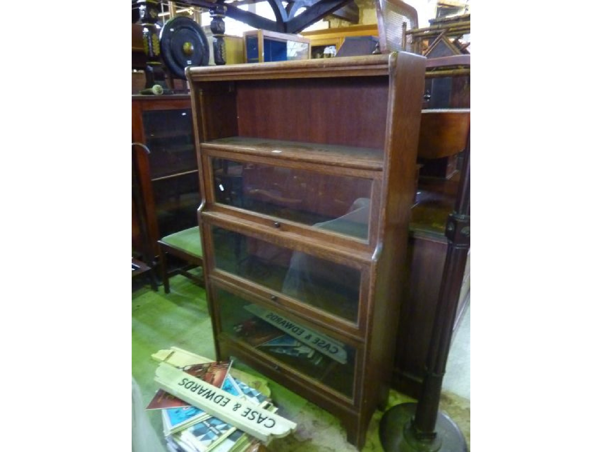 Appraisal: Small tier Globe Wernick style bookcase in oak with glazed