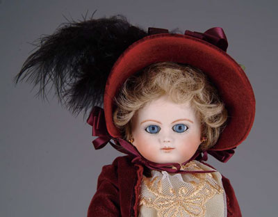 Appraisal: REPRODUCTION FRENCH BISQUE DOLL BTE SGDG CM Blonde wig blue