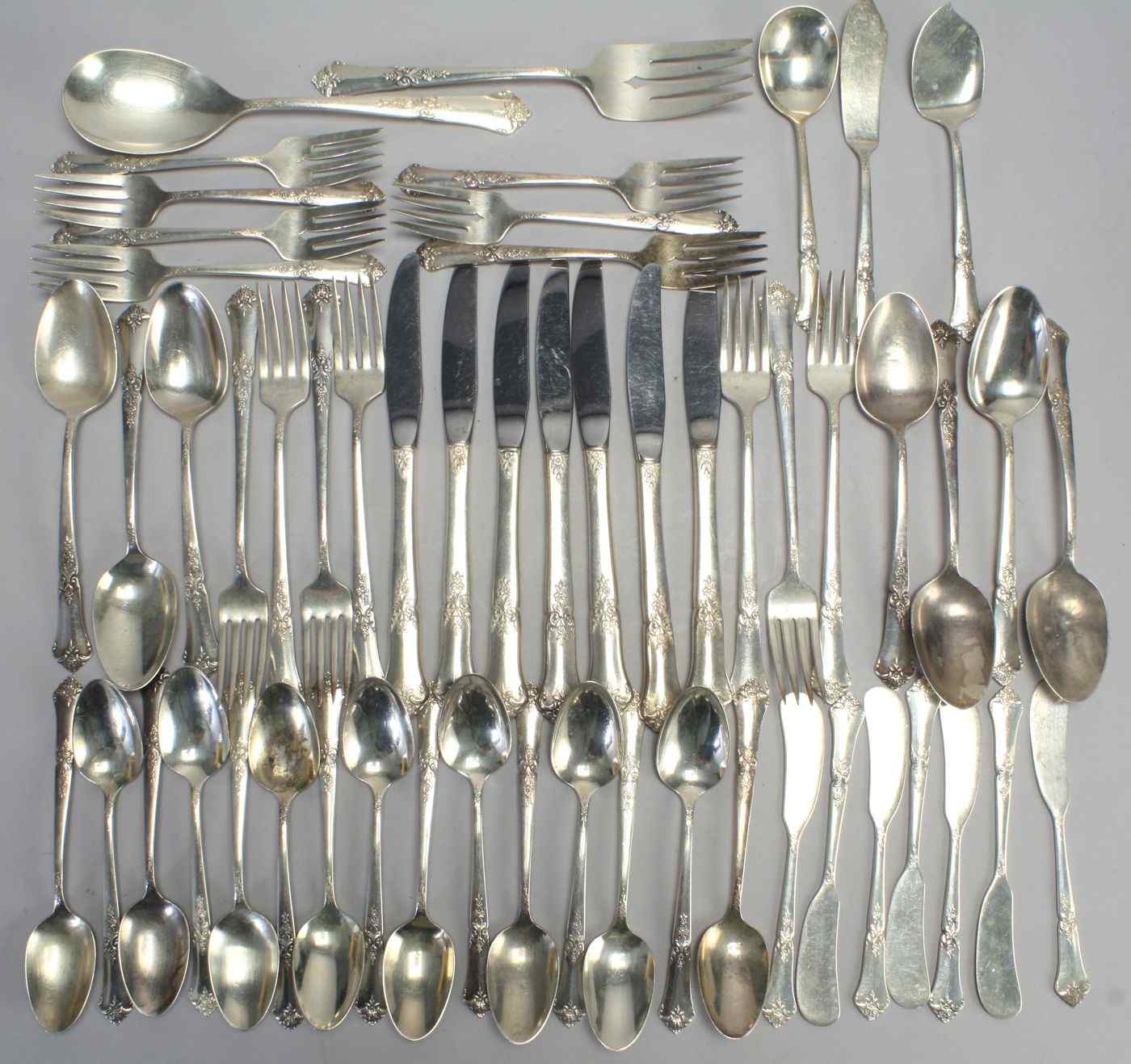 Appraisal: STATE HOUSE SILVER COMPANY STERLING SILVER PARTIAL FLATWARE SETIn the