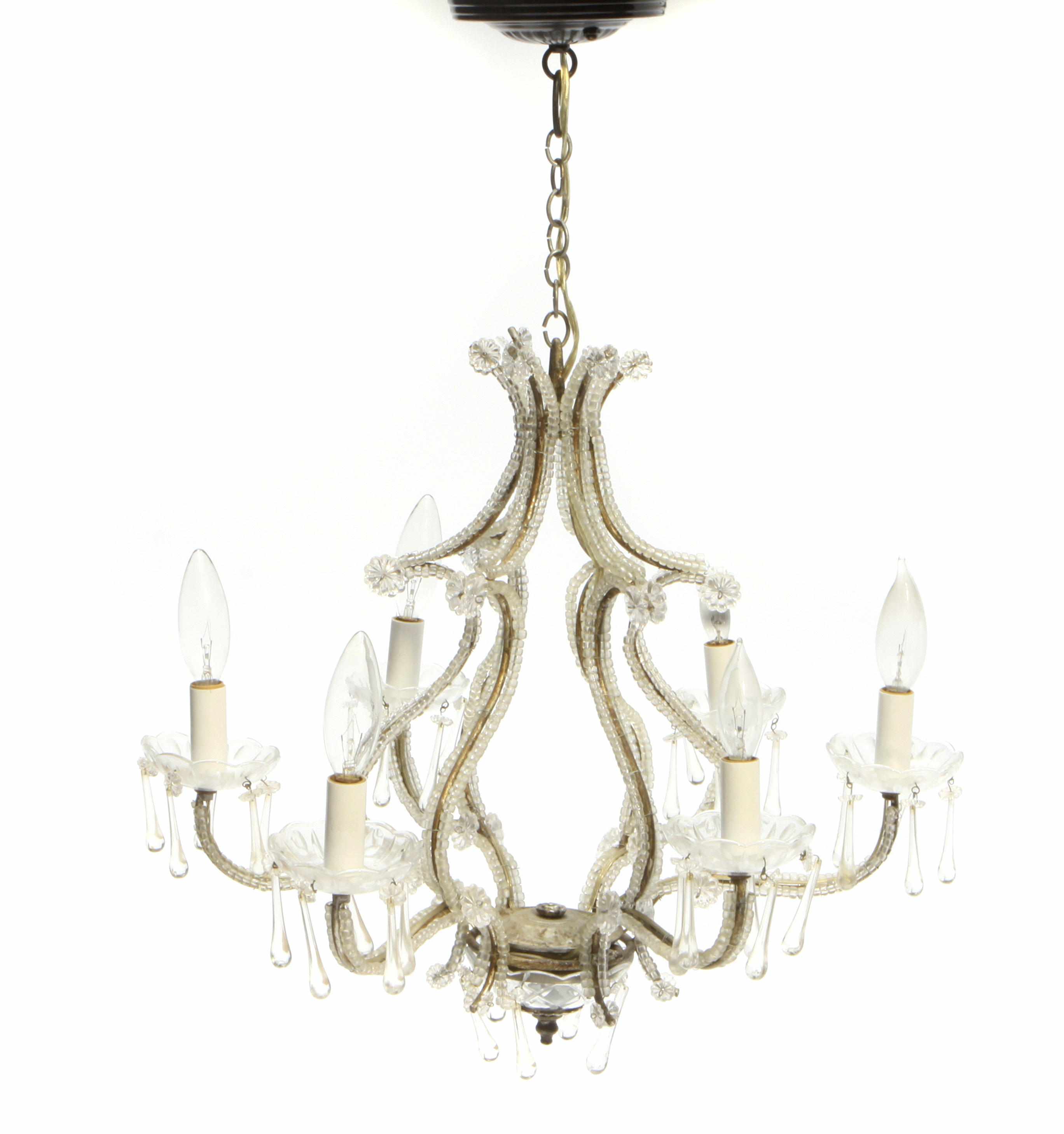 Appraisal: A Rococo style metal and glass six light chandelier height