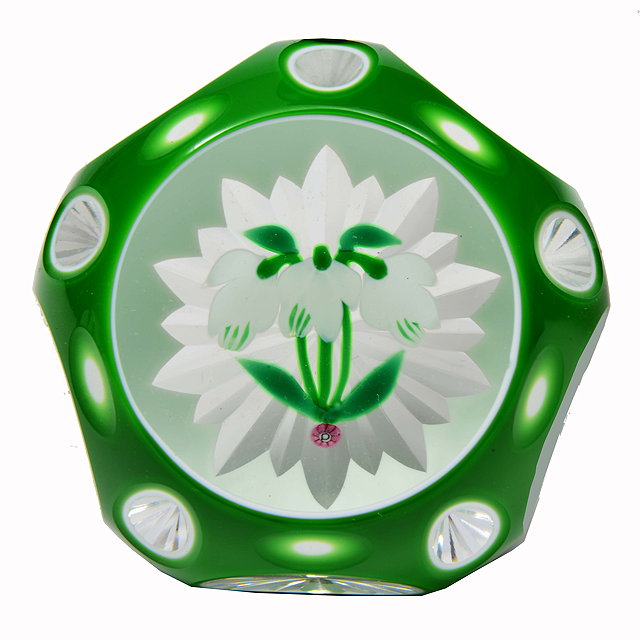 Appraisal: A PERTHSHIRE PAPERWEIGHT the green and white overlayed glass body