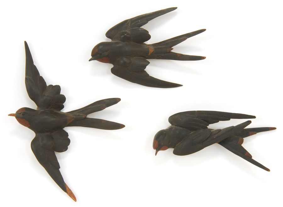 Appraisal: THREE WALL-MOUNTED LIFE-SIZE SWALLOWS Late th CenturyIn flying form