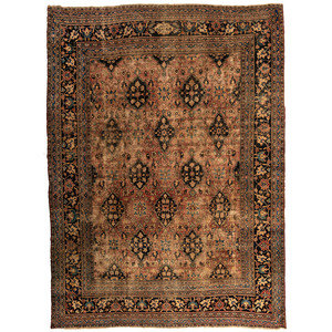 Appraisal: A Persian Wool Rug th Century feet inches x feet