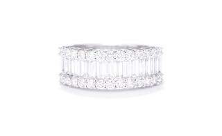 Appraisal: A DIAMOND BAND IN WHITE GOLD A row of baguettes