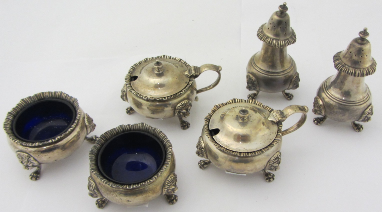 Appraisal: A silver six piece cruet set comprising a pair of