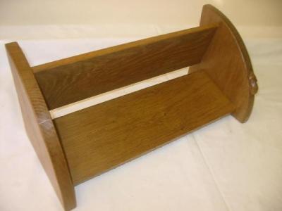 Appraisal: AN ADZED OAK BOOK TROUGH by Robert Mouseman Thompson with