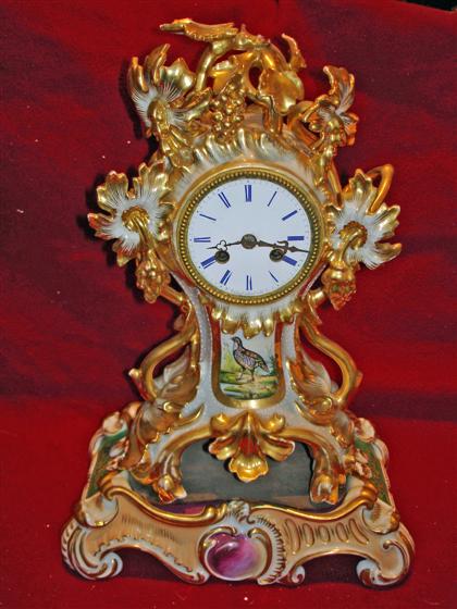 Appraisal: French rococo style porcelain bracket clocklate th century