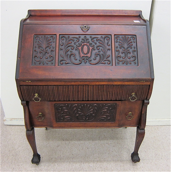 Appraisal: LATE VICTORIAN WRITING DESK American c having a relief-carved slant