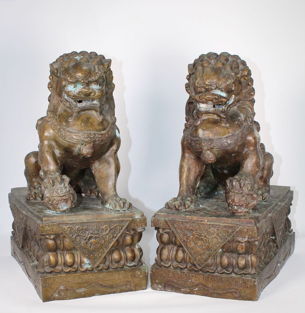 Appraisal: Pair Antique Chinese Bronze Foo Lions Pair Antique Chinese Bronze