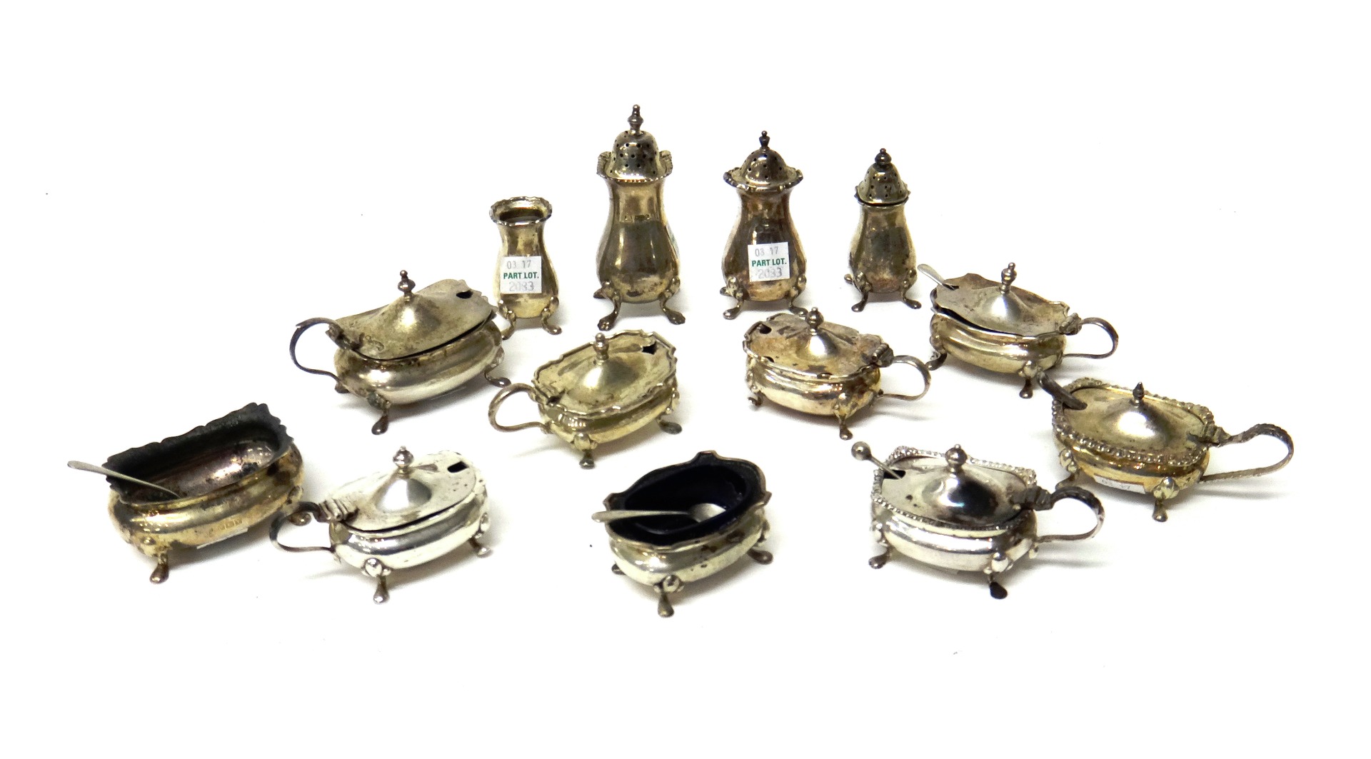 Appraisal: Silver condiments comprising seven mustard pots four pepperettes one top