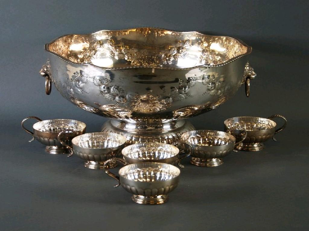 Appraisal: GEORGIAN STYLE EMBOSSED SILVER PLATED ON COPPER TWO HANDLED PEDESTAL