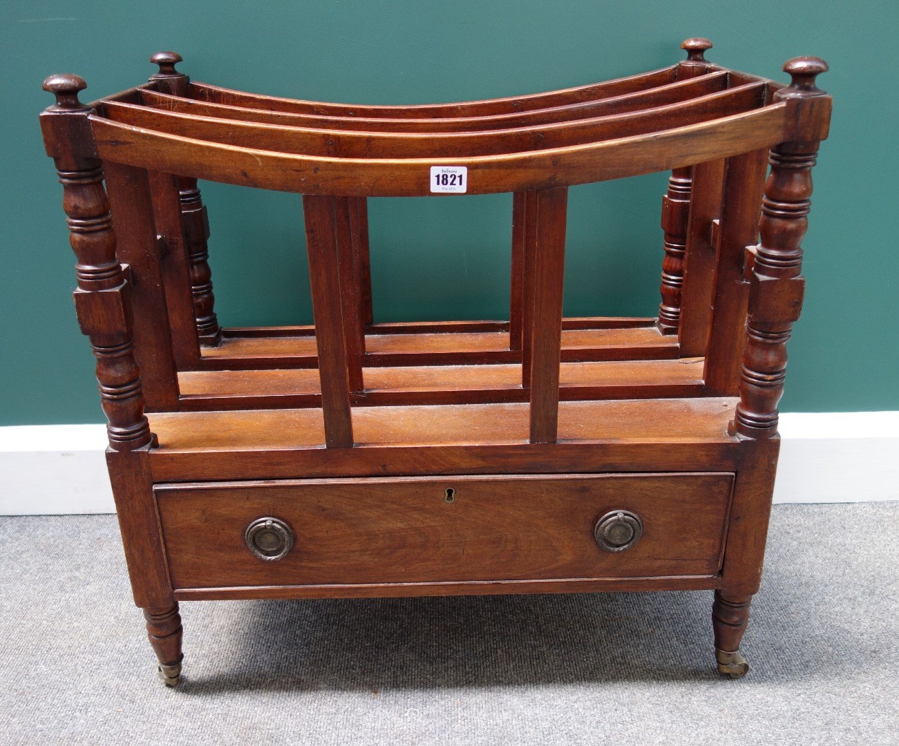 Appraisal: A th century mahogany Canterbury with concave three division top