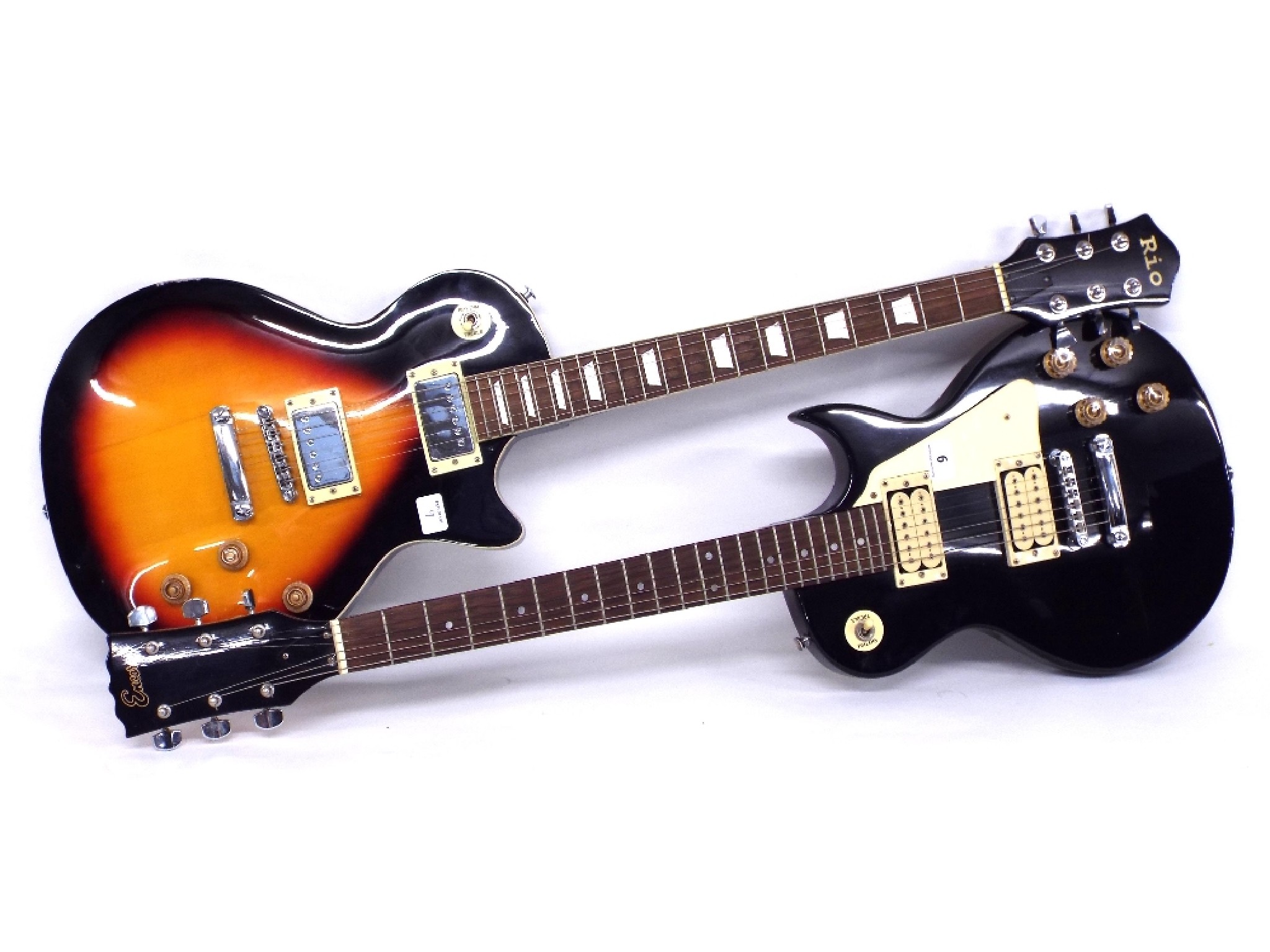 Appraisal: Encore Rio Les Paul style electric guitars both appear to