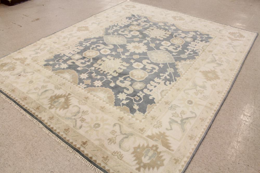 Appraisal: HAND KNOTTED ORIENTAL CARPET Turkish Oushak design ' x '