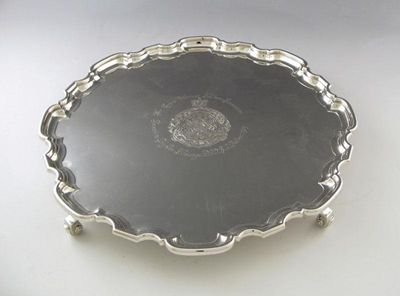 Appraisal: A presentation silver salver of circular form moulded border on