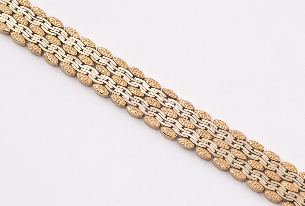 Appraisal: K TWO TONE WHITE AND YELLOW GOLD BRACELET Italian gold