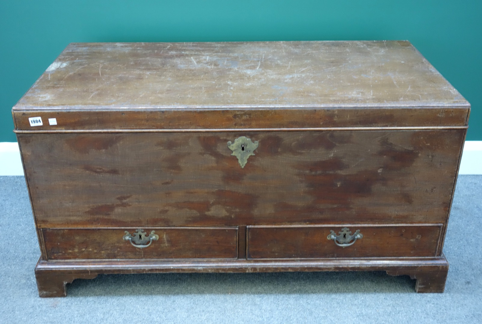 Appraisal: An th century mahogany mule chest the lift top compartment