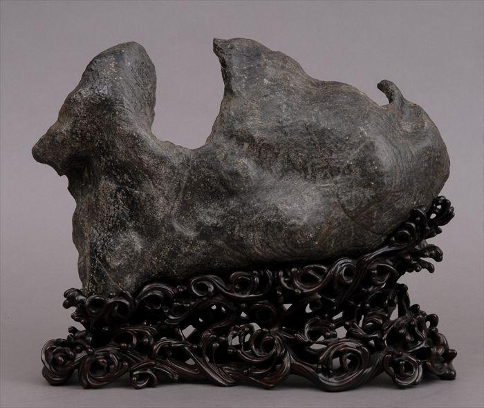 Appraisal: CHINESE CARVED GRAY SCHOLAR'S ROCK With slightly wave-form peaks and