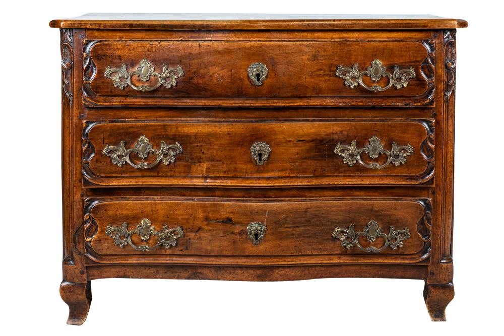 Appraisal: FRENCH CARVED WALNUT COMMODEwith three long drawers inches wide inches