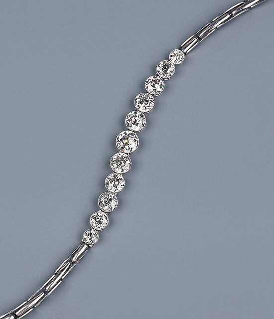 Appraisal: A DIAMOND LINE BRACELET set with graduated old brilliant-cut diamonds