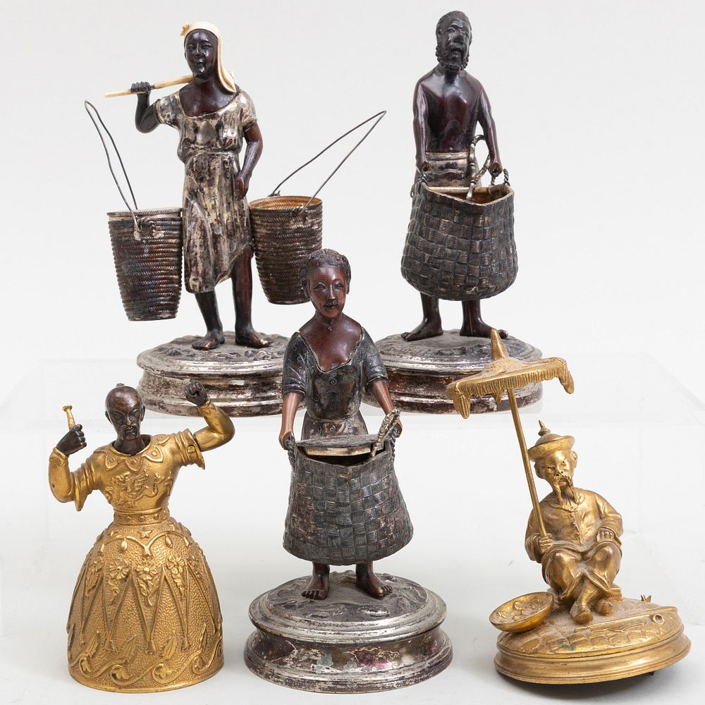 Appraisal: Group of Five Silver Plate Composite and Gilt-Metal Nubian and