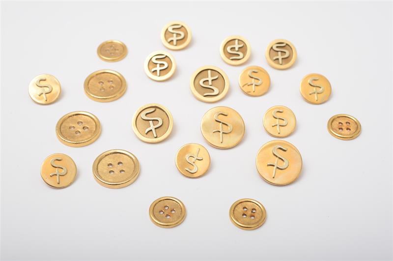 Appraisal: GROUP OF TWENTY-ONE K GOLD BUTTONS marked with initial 'SP'