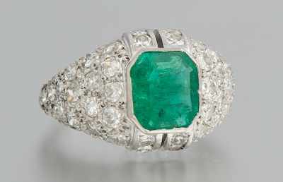 Appraisal: A Platinum Emerald and Diamond Dinner Ring Tested platinum mounting