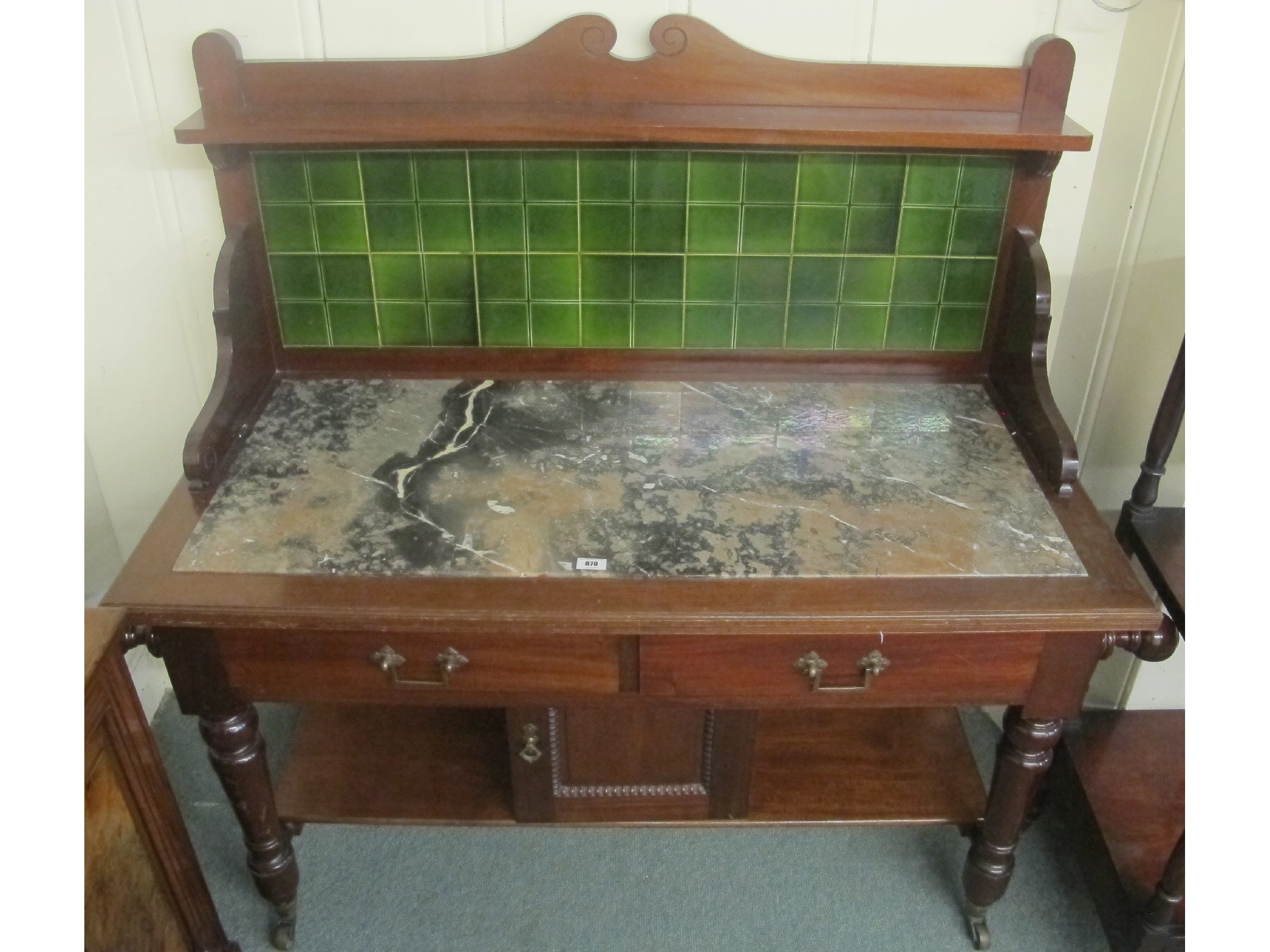 Appraisal: A Victorian mahogany marble topped wash stand