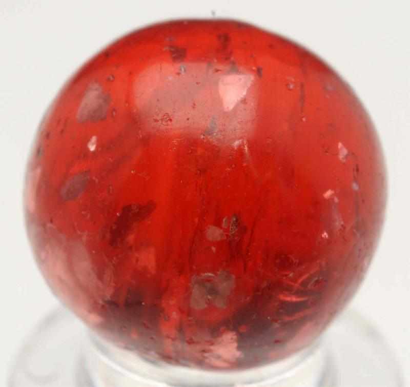 Appraisal: Red Mica Marble Red transparent base with large chunks of