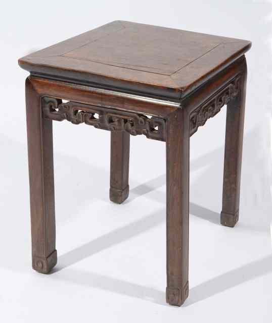 Appraisal: A CHINESE CARVED HARDWOOD SQUARE URN STAND with carved frieze