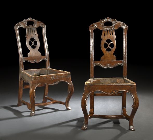 Appraisal: Pair of Portuguese Fruitwood Sidechairs late th century each with