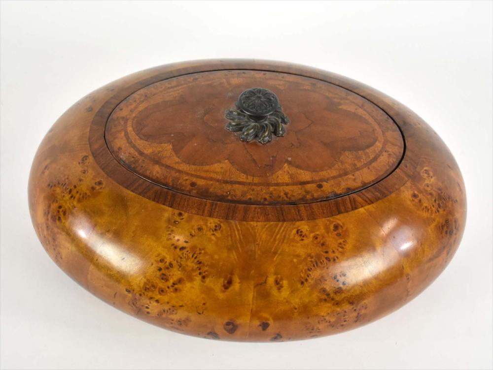 Appraisal: INLAID BURLWOOD OVAL LIDDED BOWLThe exterior with panels of burl