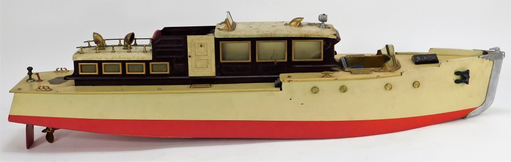 Appraisal: ORKIN CRAFT KEY WIND CABIN CRUISER TOY YACHT United States