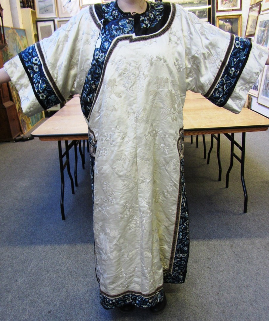 Appraisal: A Chinese silk robe circa embroidered with insects and flowers