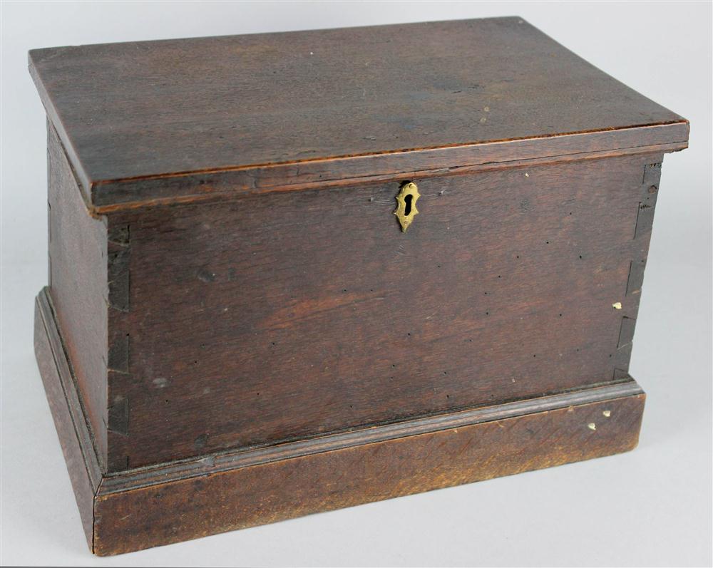 Appraisal: MINIATURE OAK BLANKET CHEST th C with hinged top iron