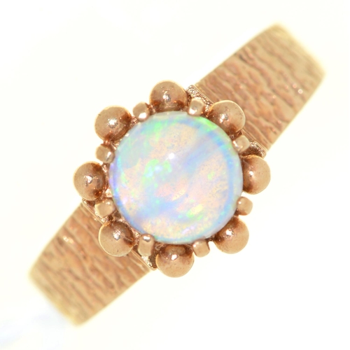 Appraisal: An opal ring in ct gold with textured shoulders Birmingham