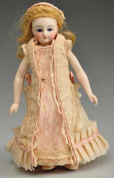 Appraisal: French Bisque Mignonnette Doll with Bare Feet Description Bisque socket